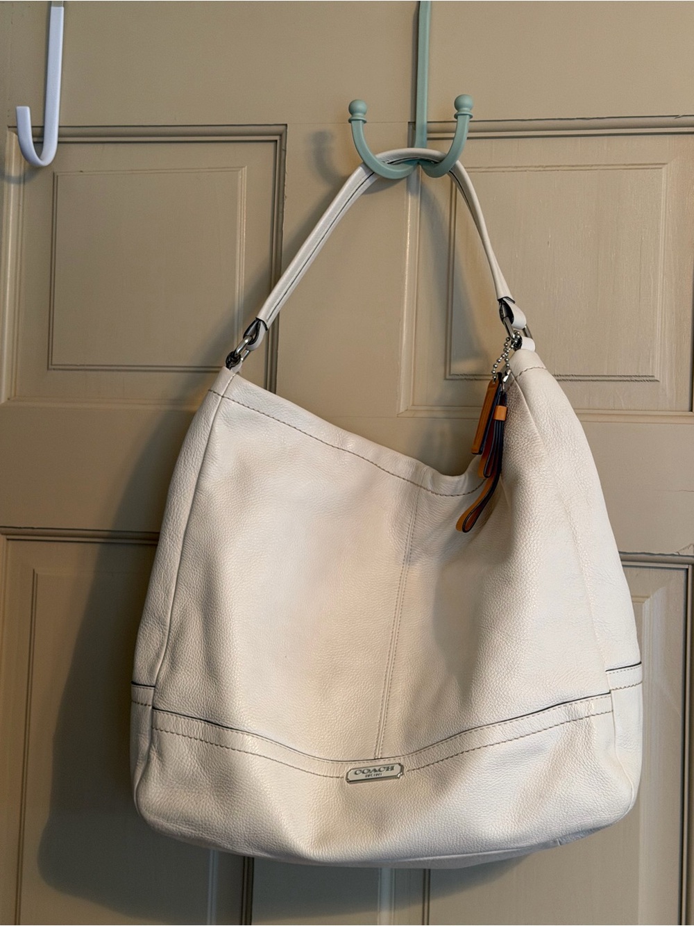 COACH Cream Pebbled Leather Shoulder Hobo with Tassel